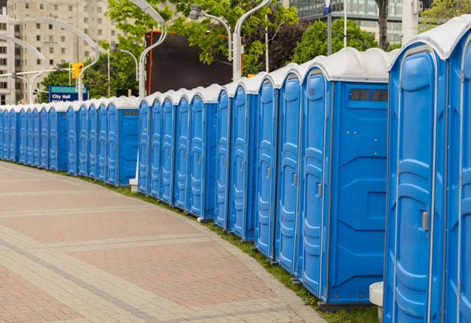 a row of portable restrooms at a fairground, offering visitors a clean and hassle-free experience in picacho